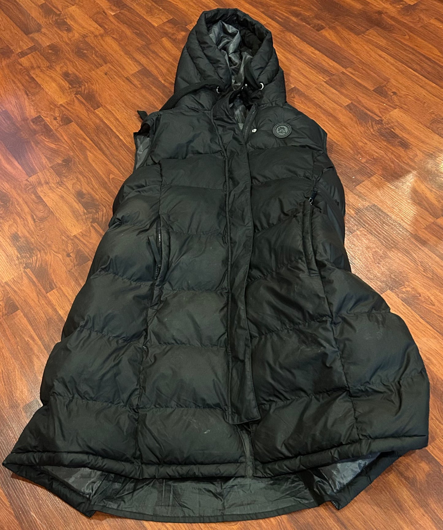 Temteq XL long puffy vest. Double ended zipper. Zipper up back.