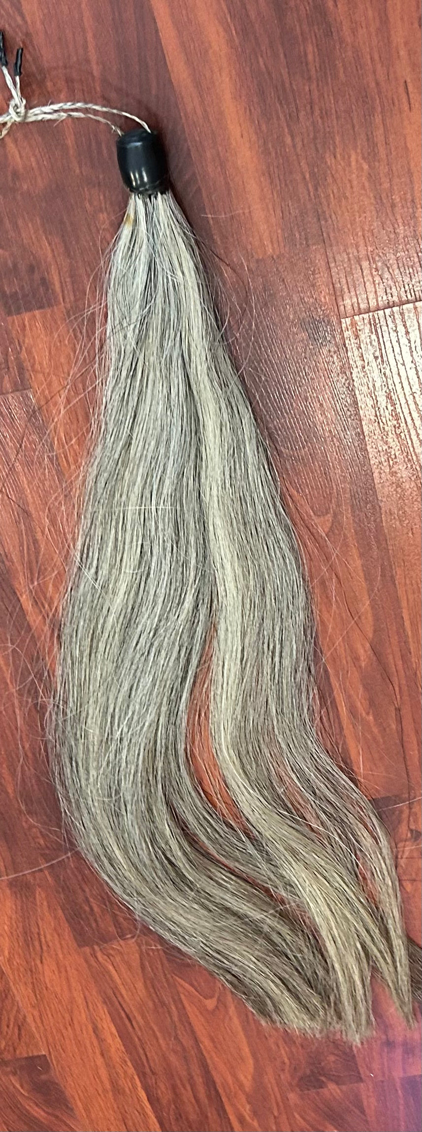 31” long grey with black and brown hairs tail extension