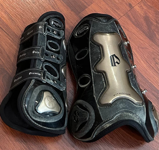Prestige T Teq medium front boots. Black and gold. Used but decent condition