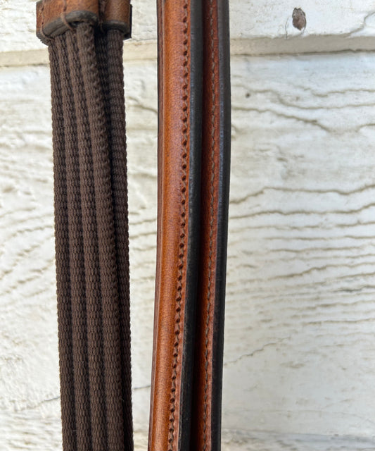 56” Havana raised leather reins nylon with hand stops. Brand new