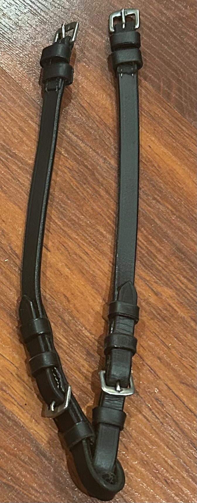 12” black cheek pieces 1/2” buckle closure. Soft leather