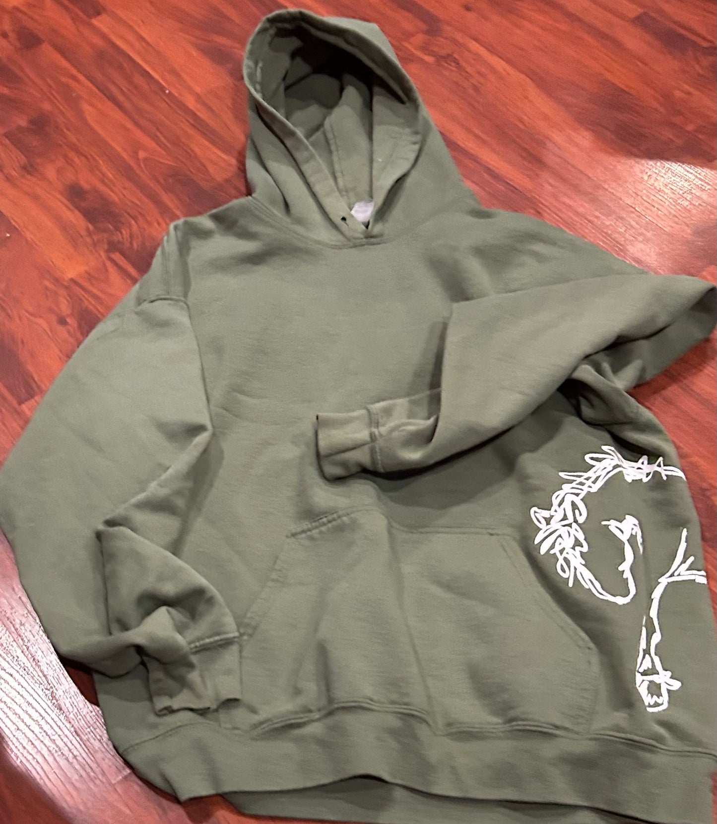 Large green hoodie. With horse. Missing hood string.