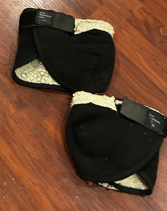 Hock shields. Set. Some damage. Small/medium