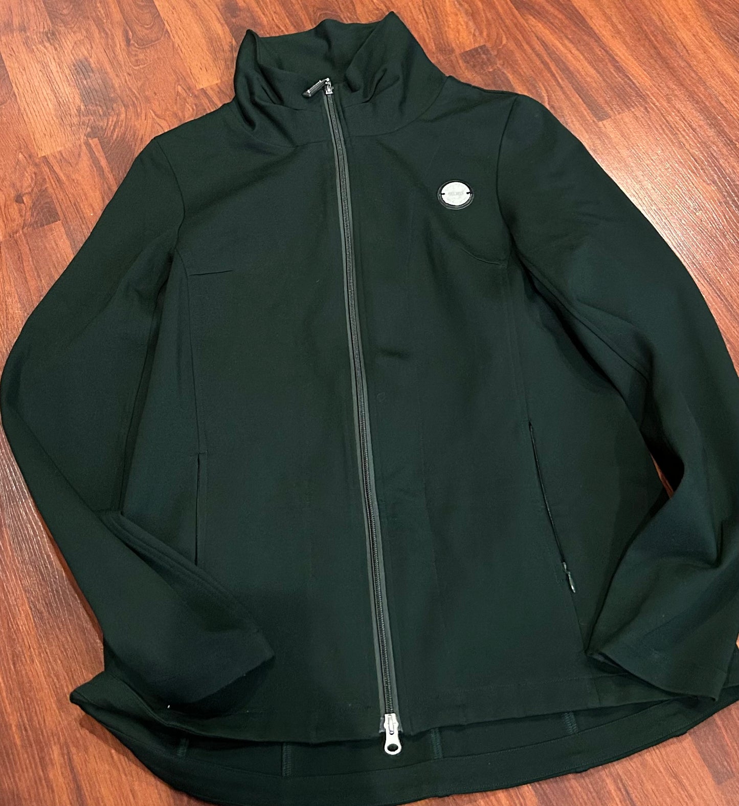 Asmar large dark green light jacket. Not water resistant.