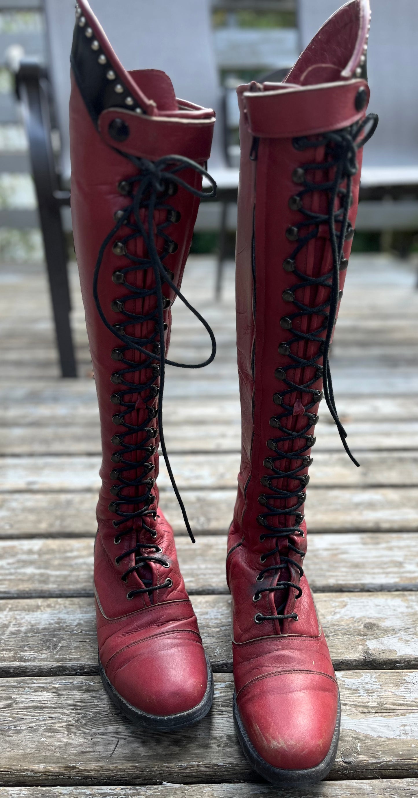 Red lace up tall boots made by Adi size 11