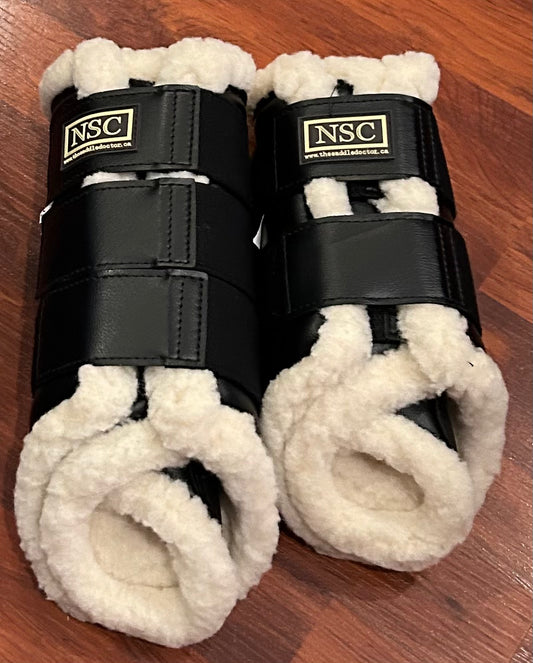 NSC black medium/large fleece boots set of 4. Brand new