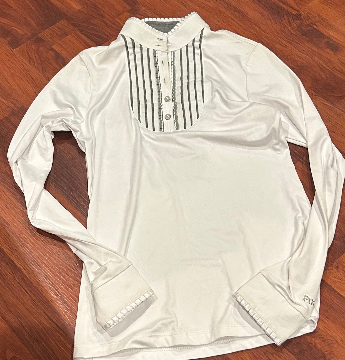 Pikeur XS (34) long sleeve show shirt. Missing top two buttons on neck.