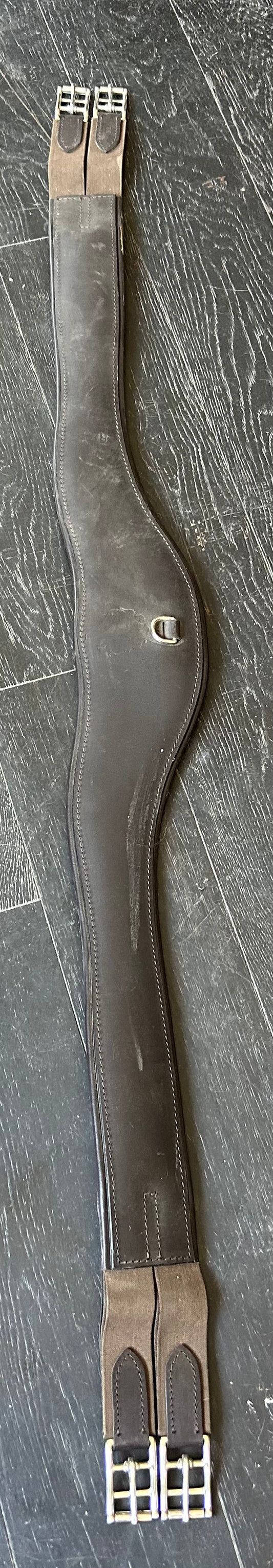 56” NSC brown leather girth. Excellent condition.