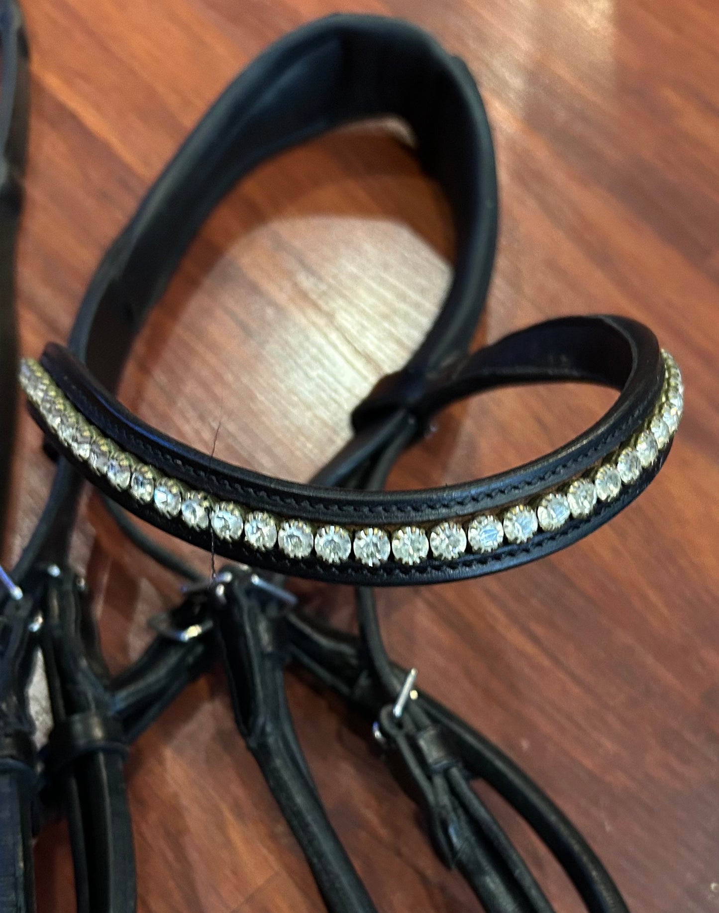 Schockemohle full size black patent rolled snaffle bridle