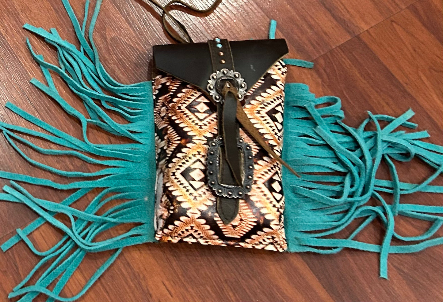 Saddle bag with teal fringe