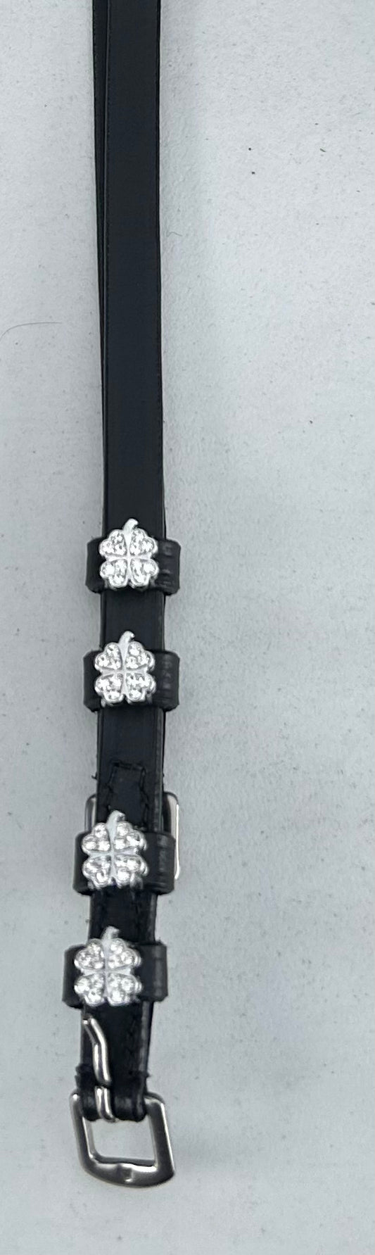 Black leather spur straps shamrock charm