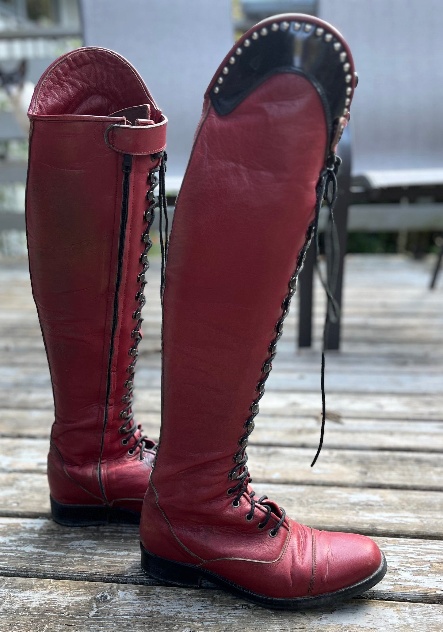 Red lace up tall boots made by Adi size 11