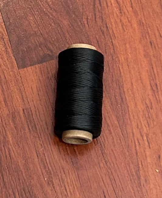50m black waxed thread. Brand new