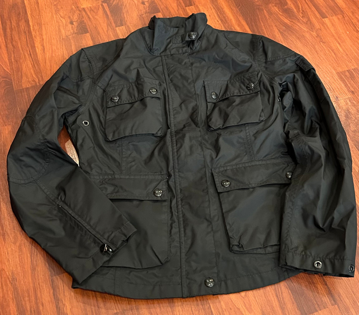 Wellensteyn medium black rain jacket. No hood.