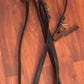Rubber grip black reins. Brass buckle ends
