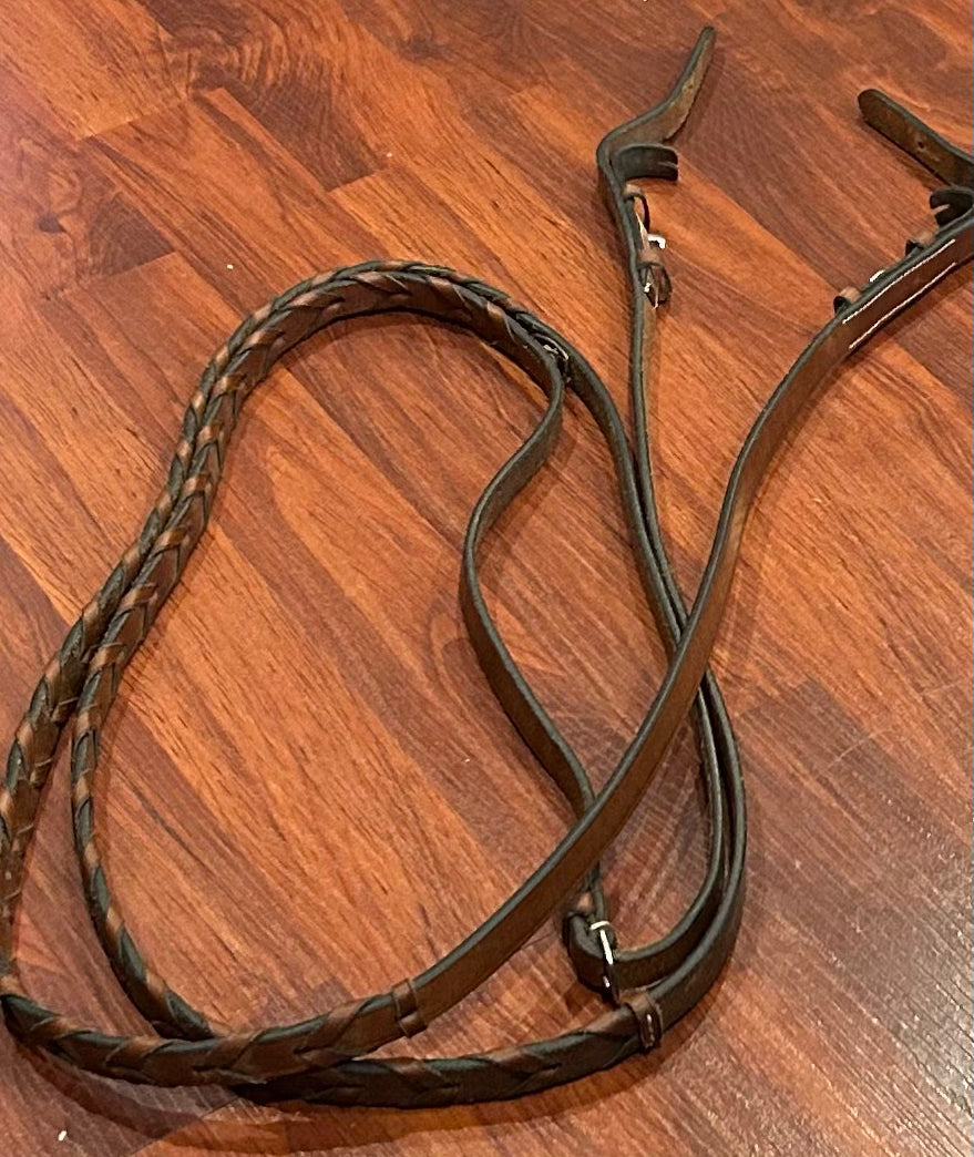Brown braided reins. Hook closures.