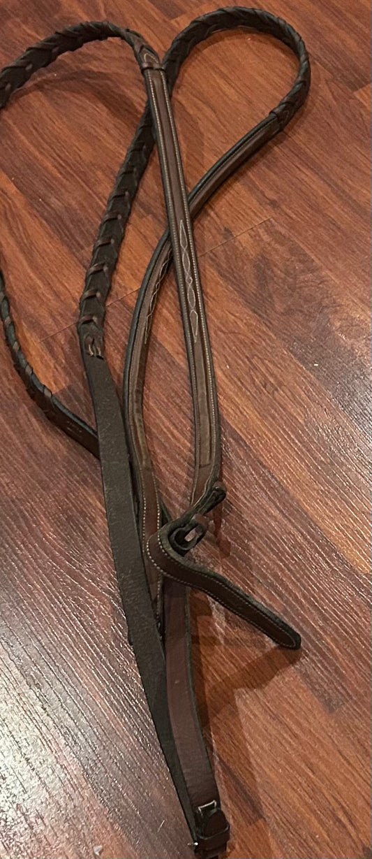 brown fancy stitch braided reins. Hook closures. Some wear