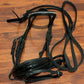 Solo snaffle bridle Cob. Rolled with patent noseband and browband. Comes with rubber reins