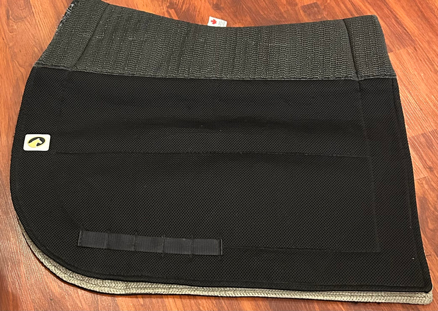 Ecogold black dressage pad. Some wear at wither.