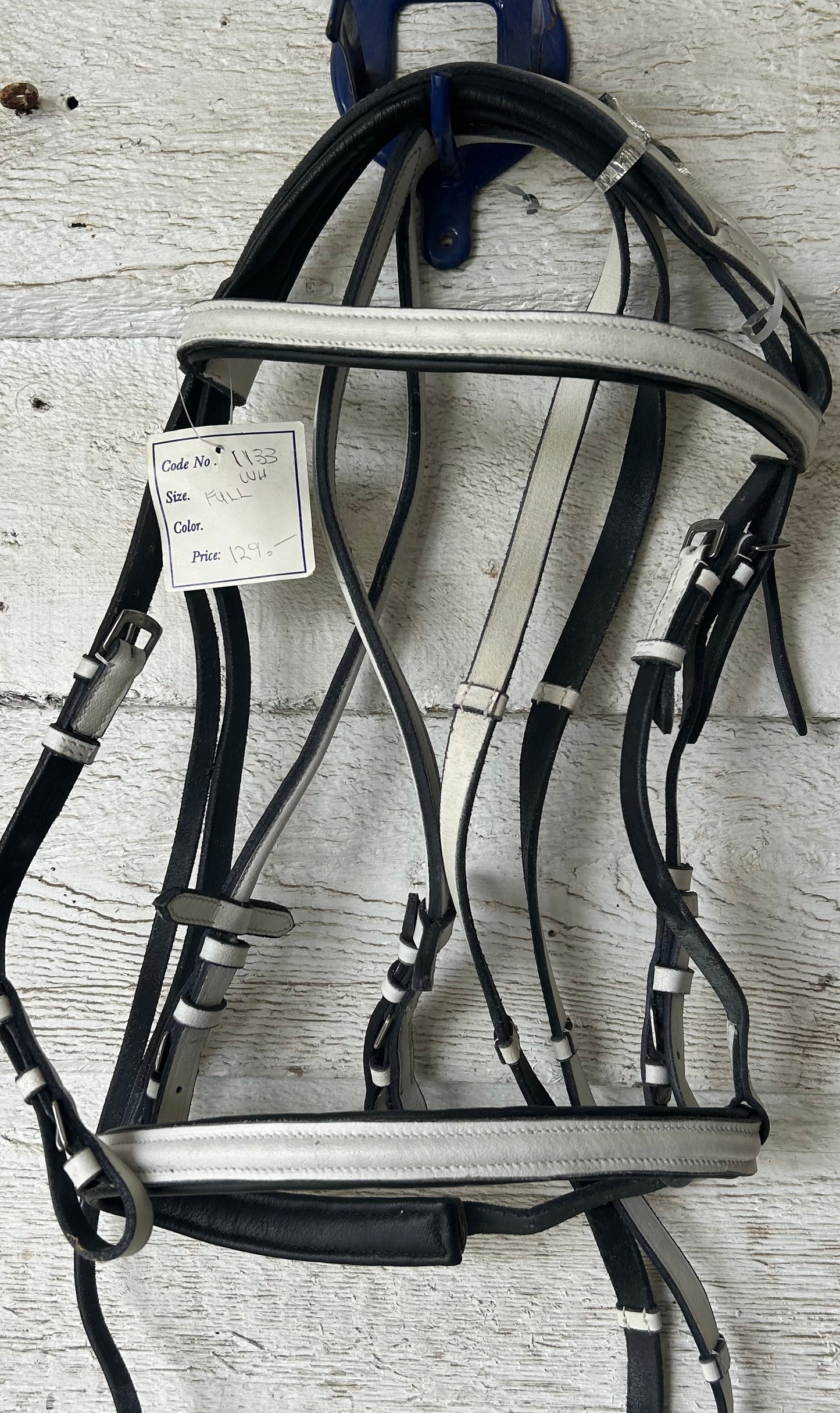 White bridle full size black trim. With reins