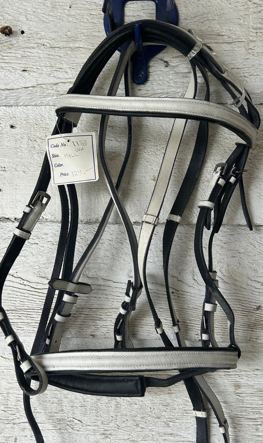 White bridle full size black trim. With reins