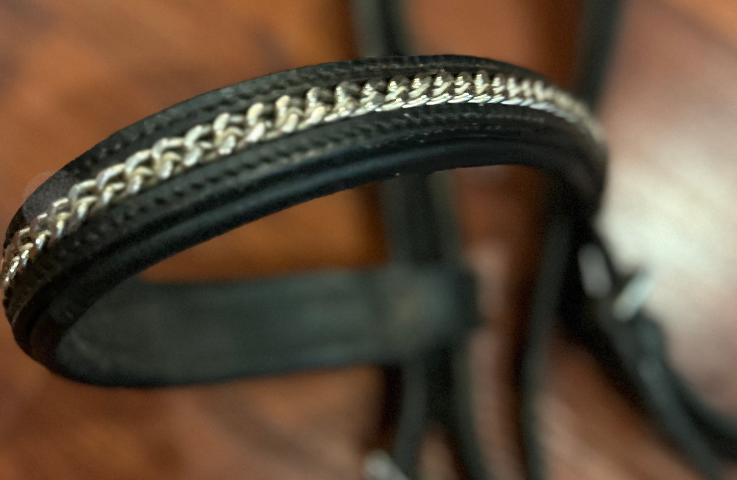 Black leather snaffle bridle with chain decoration