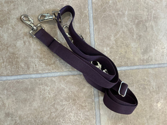 Purple leg straps shedrow