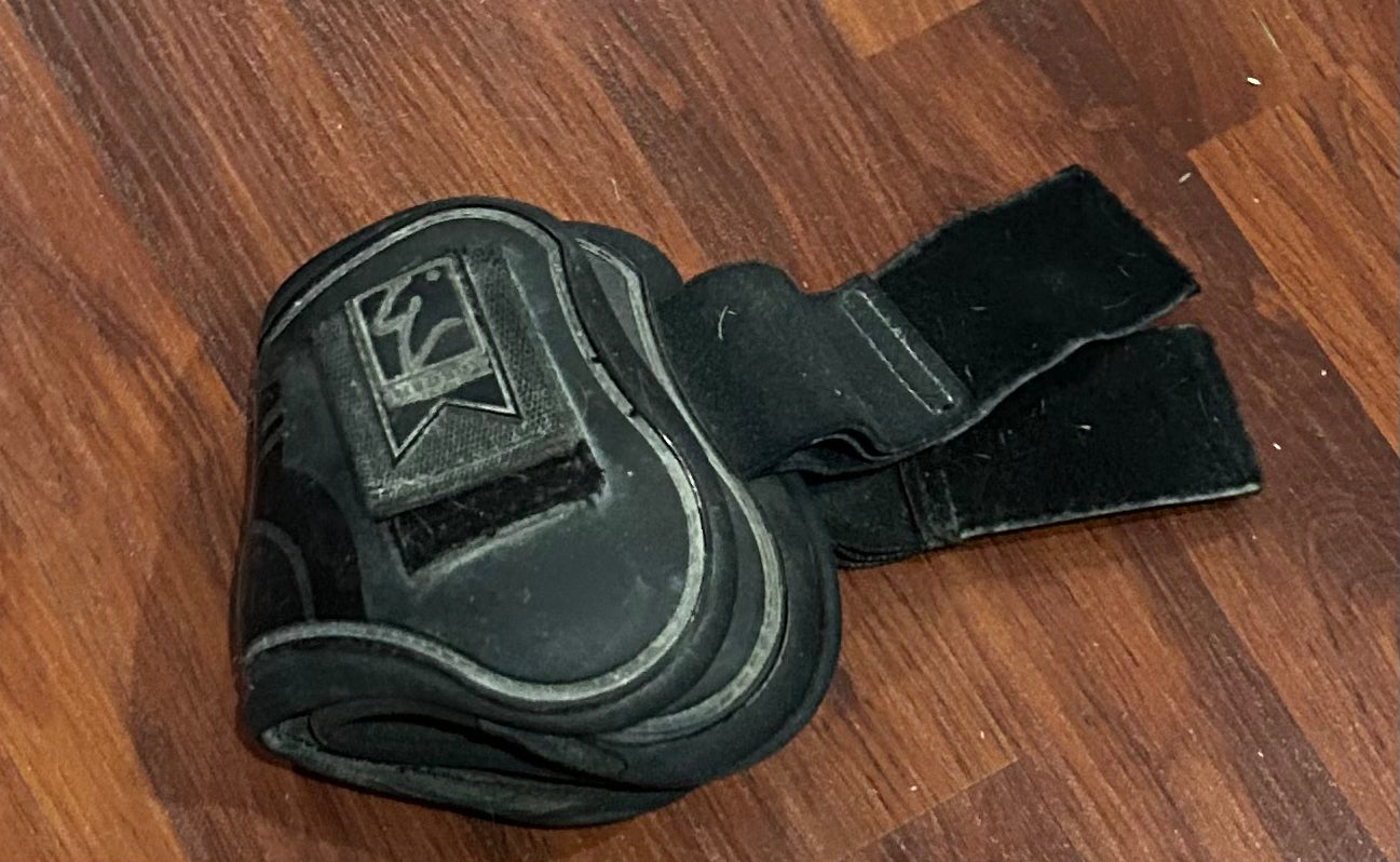 Shedrow Black full size fetlock boots. Dirty