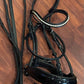 Schockemohle full size black patent rolled snaffle bridle