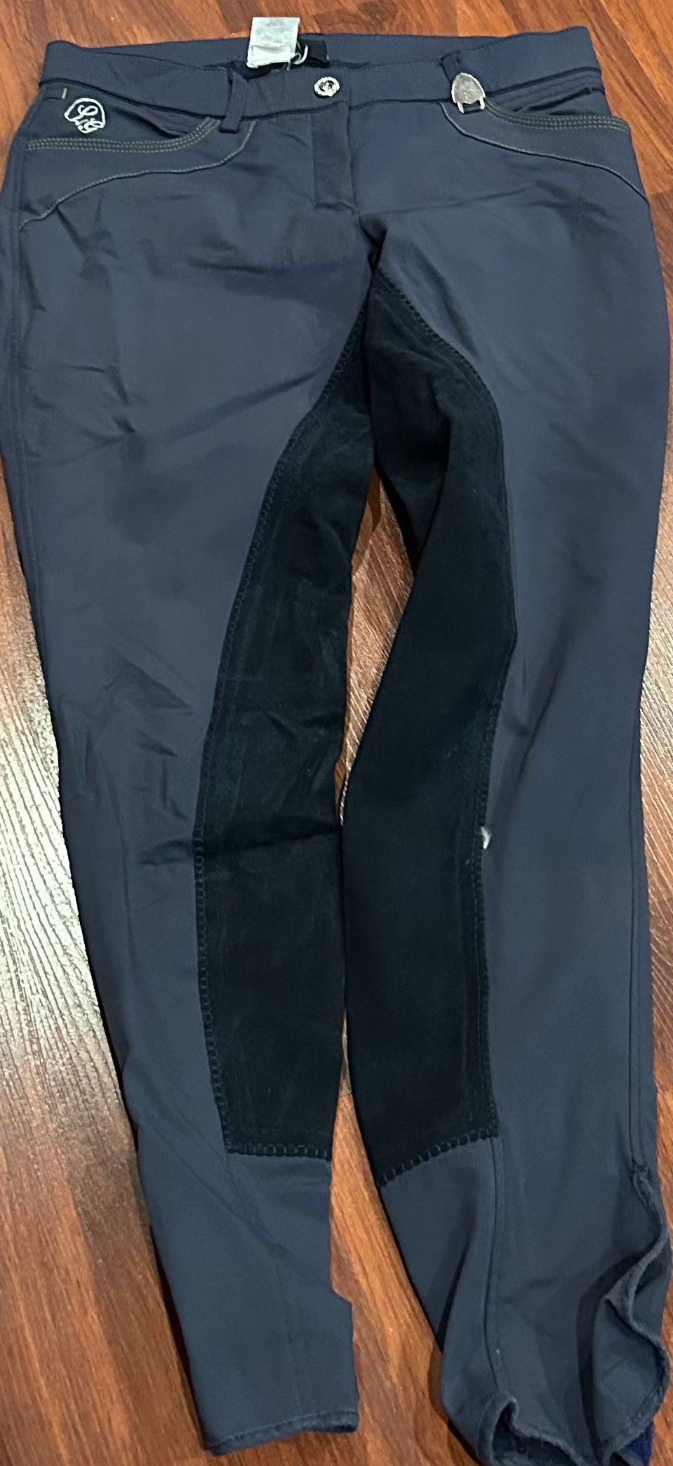Laura Garrelli size 26 navy full seat breeches. Velcro ankles