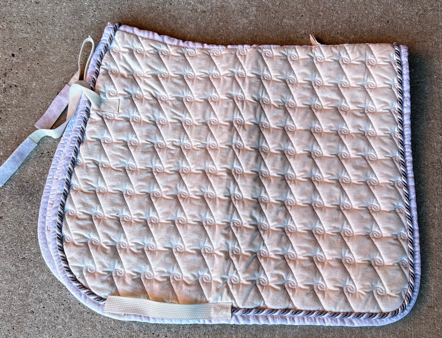 Eskadron cream dressage pad.