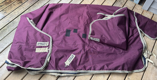 84” amigo hero rip shop plus 100g with hood. Repaired. Some lining damage.