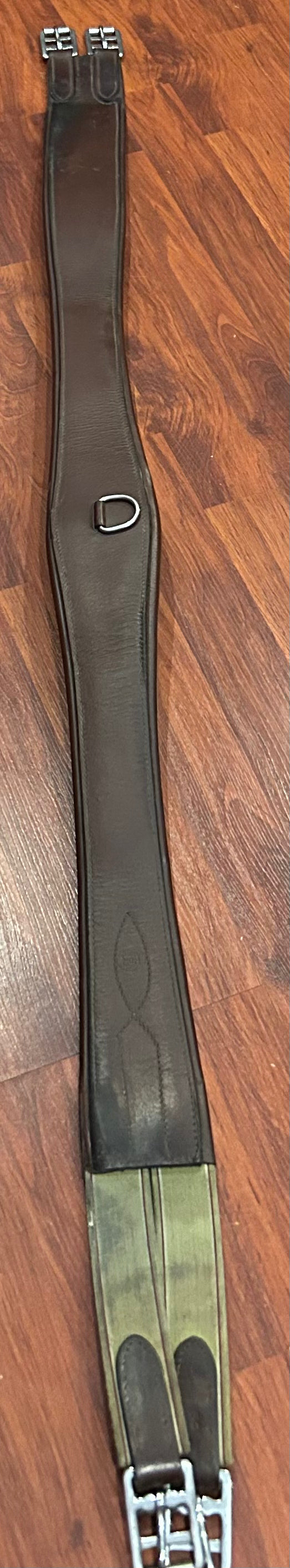54” Brown leather girth. Elastic one end