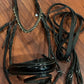 Solo rolled snaffle bridle black crank. Black and gold browband. Needs oiled
