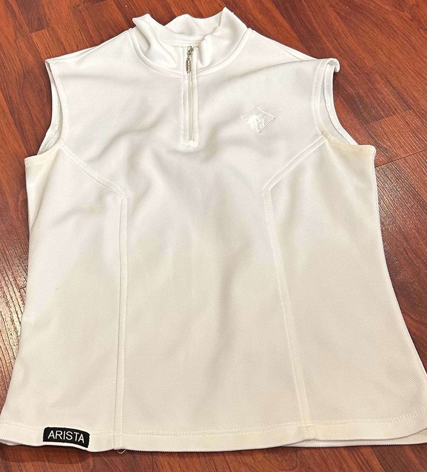 Arista medium white sleeveless show shirt. Minor staining under arms