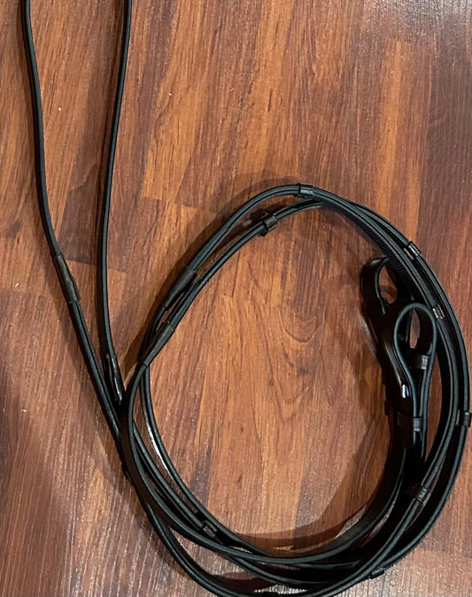 Solo Full size brown rubber lined reins. New condition