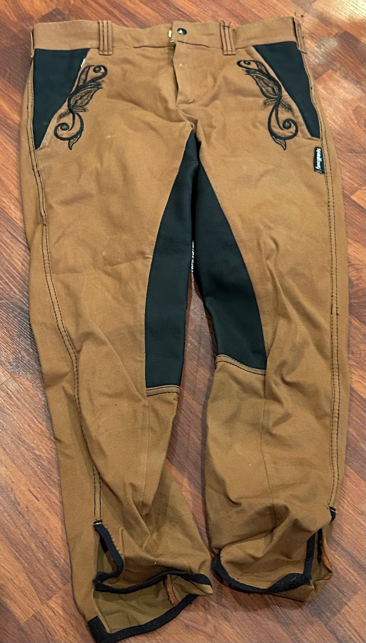 Size 28 fancy pants full seat breeches brown and black. Velcro ankles