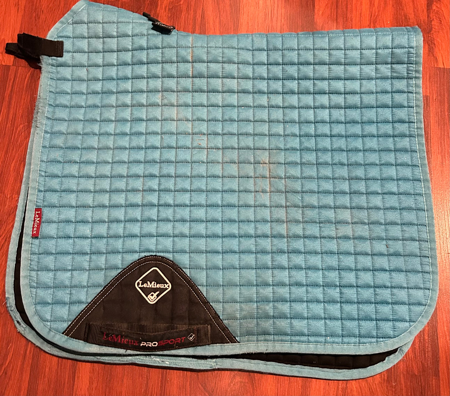 Lemieux teal large dressage pad (worn and repaired)