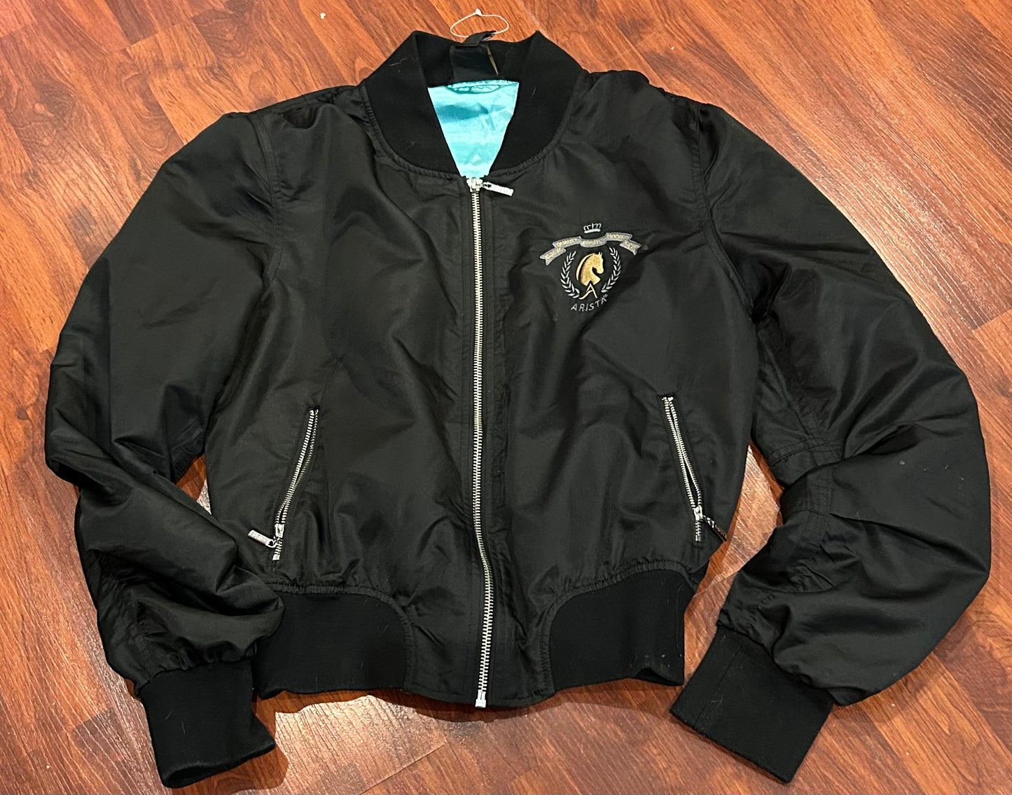 Arista medium black with teal lining light jacket