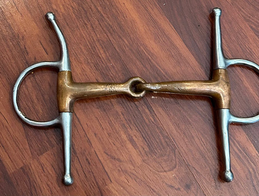 5” copper full cheek snaffle. One cheek slightly bent