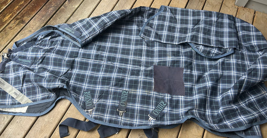 84” amigo blue plaid 0g with hood. Repaired. Some lining damage.