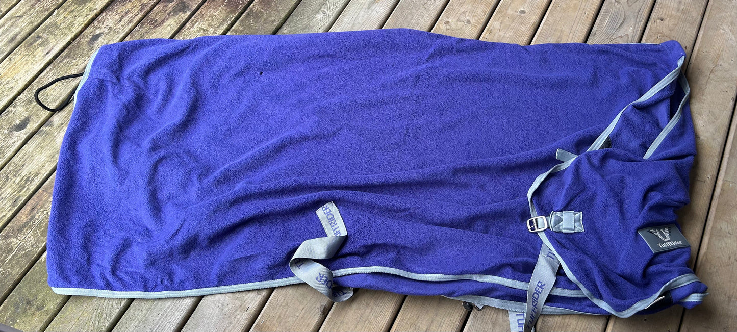 87” Tuffrider navy fleece cooler. Some small holes.