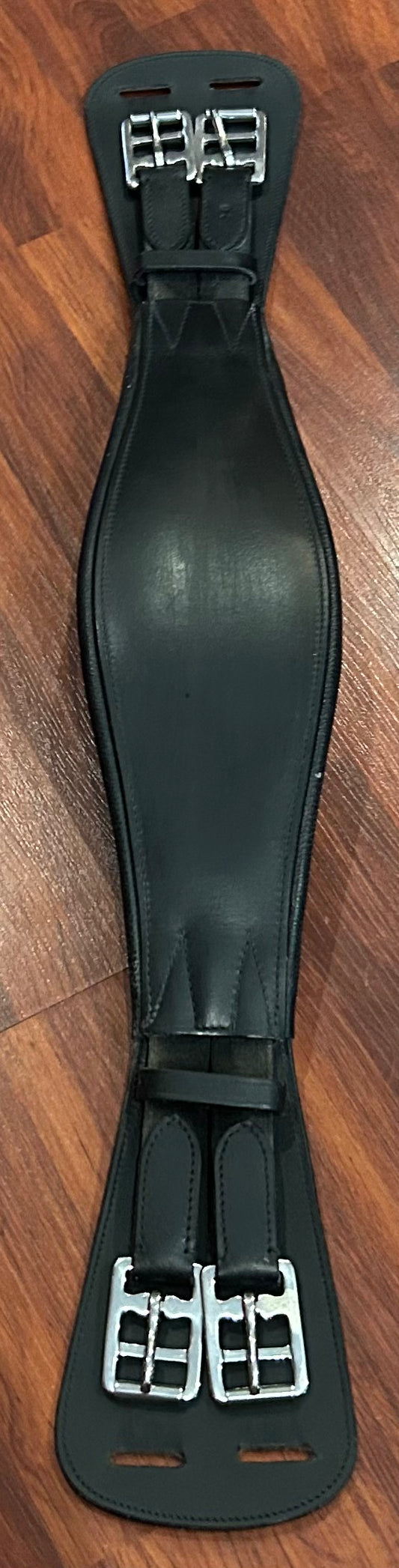 26” black dressage girth. Elastic both ends