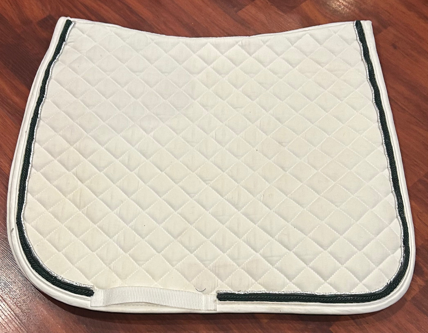 Shedrow full size pad white. Green and silver trim. A Few hairs.