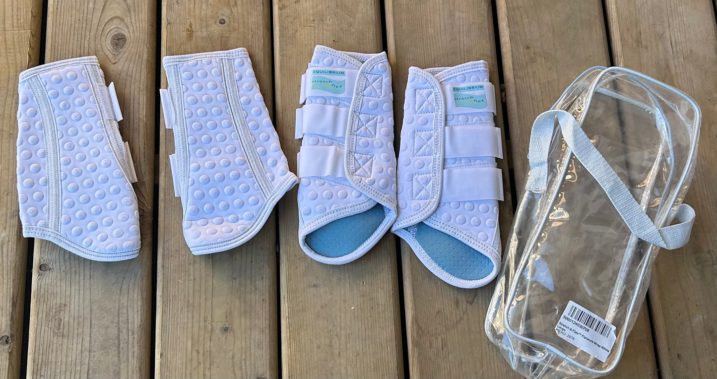 Equilibrium stretch and flex white wraps set of 4 large. Like new.