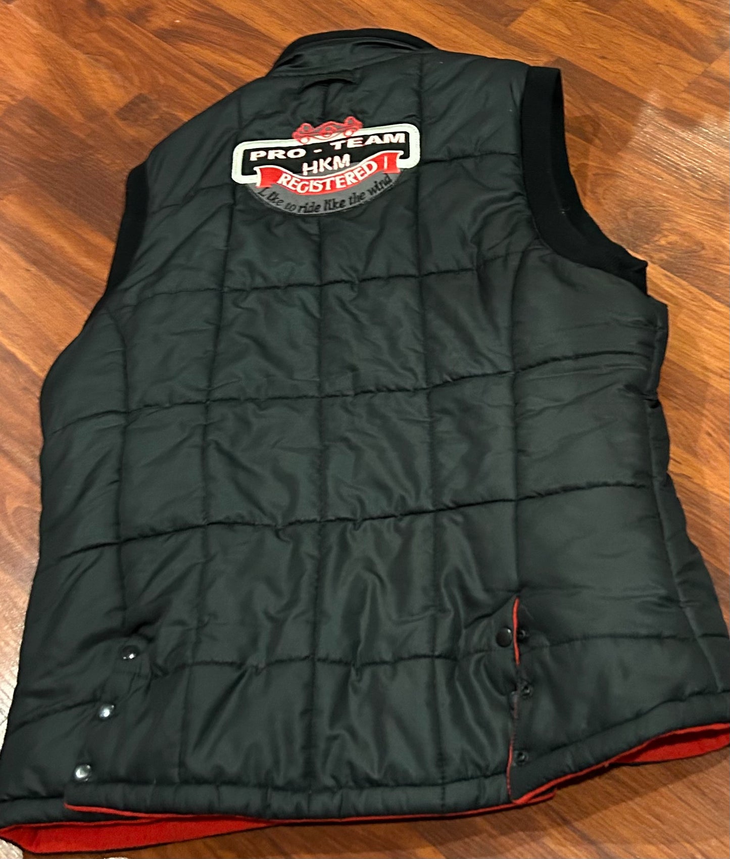 HKM XL reversible vest. Black quilted and red fleece