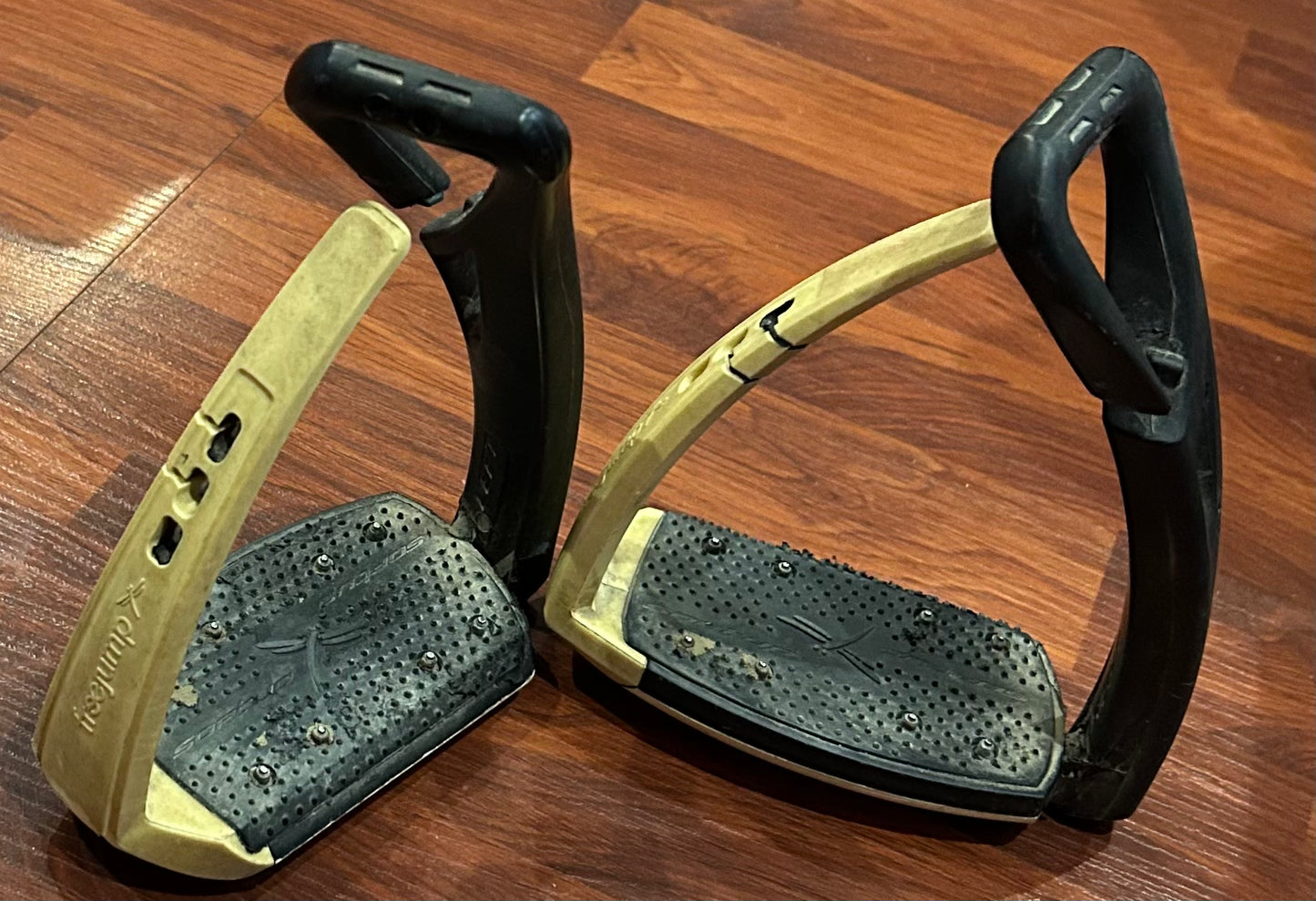 FreeJump stirrups cream and black. Minor damage to foot bed