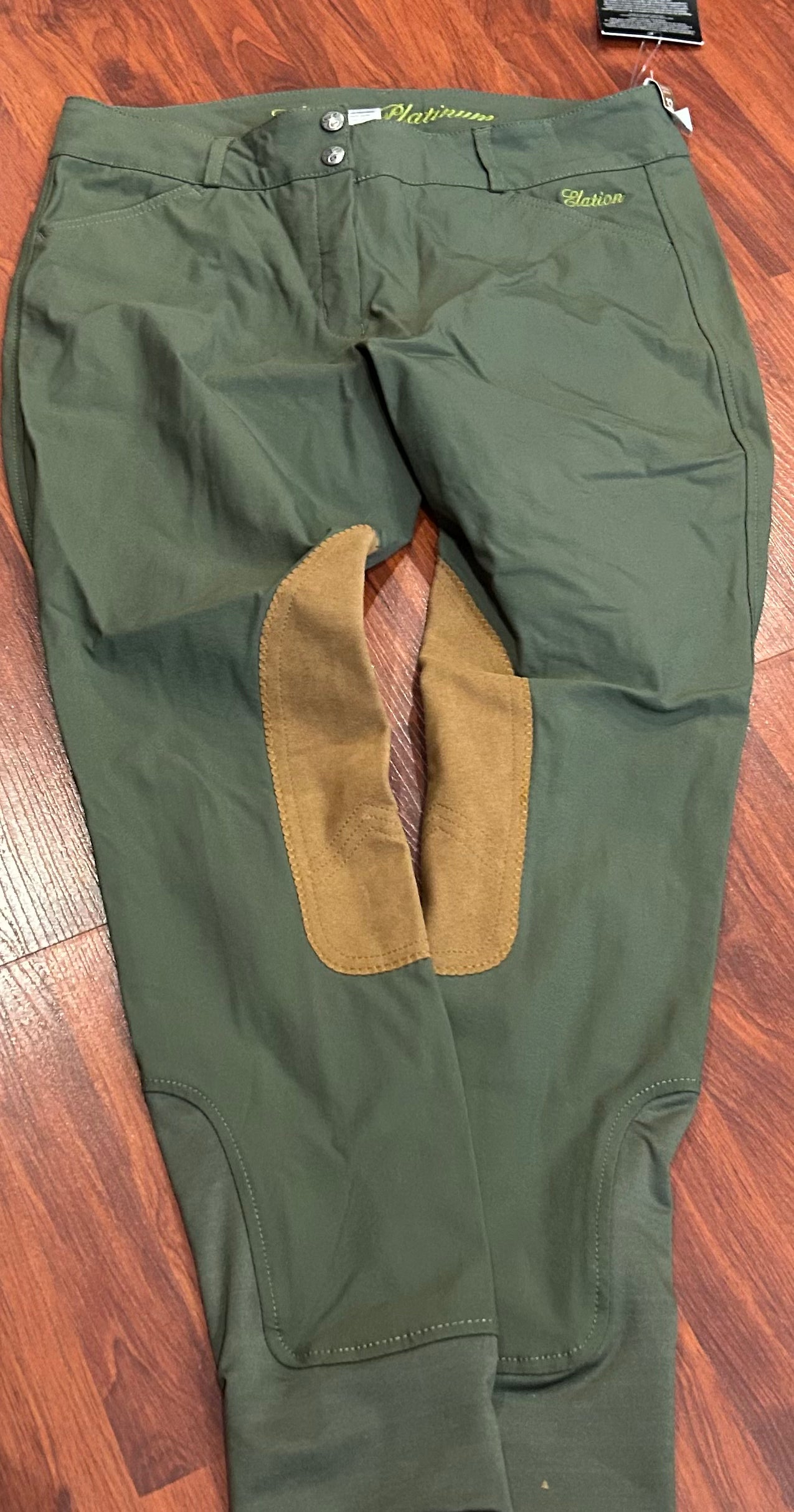 Elation 32R green knee patch breeches. Brand new