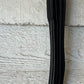 Black reins buckle closure. 56” raised with grippy  rubber.