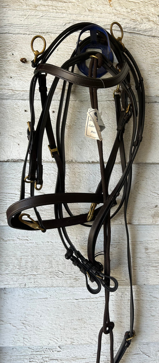 De Gouge full size with attached training bridle and reins.